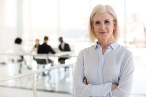 Confident lady business coach team leader posing in office, port